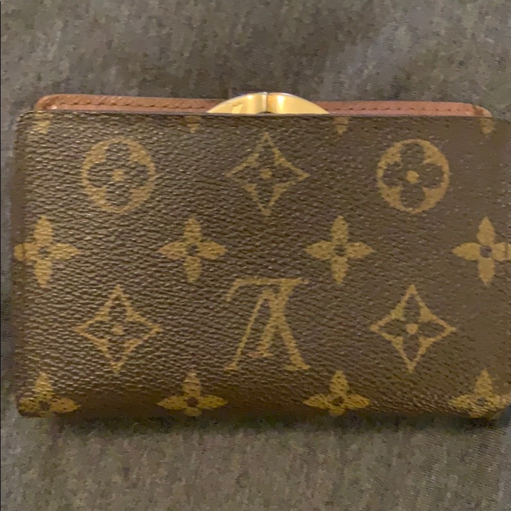 Authentic LV wallet, some minor scratches and used.